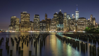 City skyline night water tall 3 - evaline ness free wallpaper