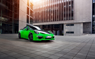 Green sports car city street 3 - a green sports car free wallpaper