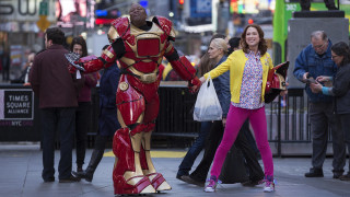 Woman ironman statue city street - maximalism free wallpaper