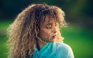 Curly haired woman blue shirt - alexis simon belle free wallpaper