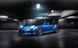 Blue porsche sports car parking - a parking garage free wallpaper