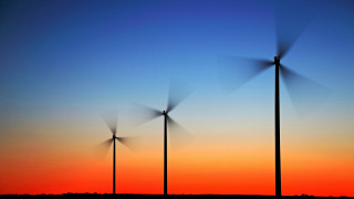 Wind turbines sunset blue sky - orange free wallpaper