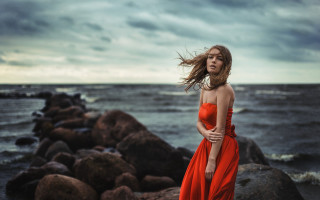 Woman red dress ocean rocks - the wind free wallpaper