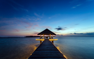 Pier hut night lights blue - a hut free wallpaper