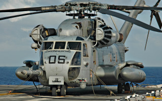 Helicopter aircraftcarrier ocean clouds cobra - a helicopter free wallpaper