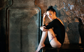 Woman sitting tattoo black hair - a stool free wallpaper