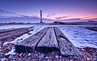 Wooden bench snow lighthouse sunset - a wooden bench free wallpaper