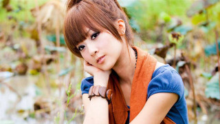 Woman blue shirt brown vest - anime style free wallpaper