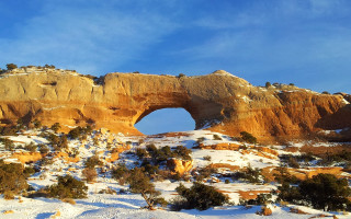 Snow mountain rock arch beach - chris labrooy free wallpaper