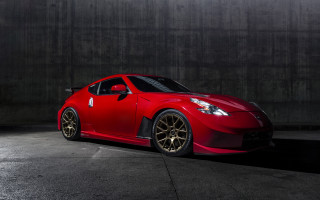 Red sports car dark room 33 - a concrete wall behind free wallpaper