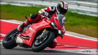 Motorcycle racetrack grass blurry helmet - hard edge free wallpaper
