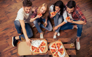 Group people eating pizza sitting - same free wallpaper