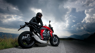 Man helmet motorcycle road cloudy - motorcycle free wallpaper