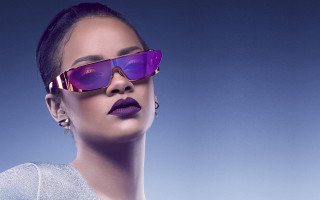 Woman purple sunglasses silver dress - a blue sky behind her free wallpaper