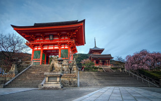 Red building statue stairs pagoda - a statue in front free wallpaper