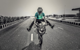 Motorcycle rider urban skyline trees - daryush shokof free wallpaper