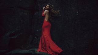 Red dress woman rock wall - the wind free wallpaper