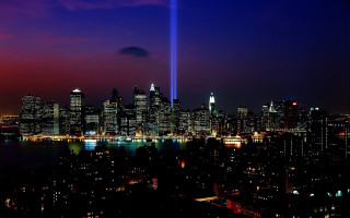 City skyline light beam night - free light wallpaper
