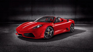 Red sports car dark room 89 - a black background and a spotlight free wallpaper