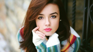 Woman sweater posing hand chin - a sweater free wallpaper