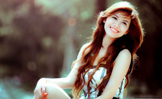 Woman smiling bench long hair - red free wallpaper
