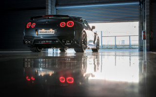 Black sports car garage tilt - it in front free wallpaper