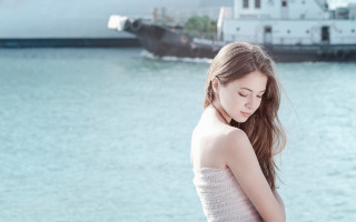Elina karimova sunny waterboat portrait - a boat in the background free wallpaper