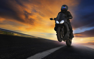 Motorcycle sunset sky clouds futurism - a person riding free wallpaper