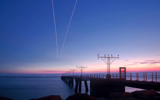 Pier plane sunset contrails water 5 - sunset free wallpaper