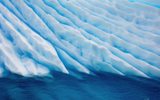 Iceberg snow wave beach sky - a large iceberg free wallpaper