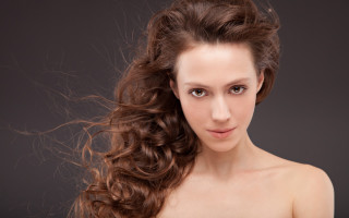 Blowing hair portrait brown eyes 2 - flowing hair free wallpaper