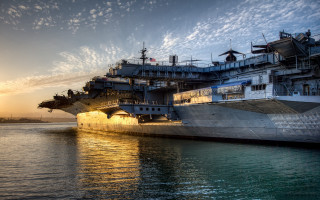 Large ship sunset clouds backlit - a sunset in the background free wallpaper