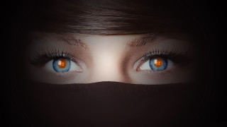 Woman eyes black veil closeup - a black cloth free wallpaper