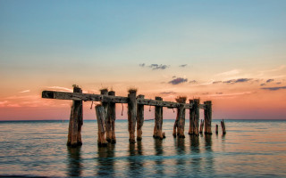 Wooden pier sunset water clouds - the middle of a body free wallpaper