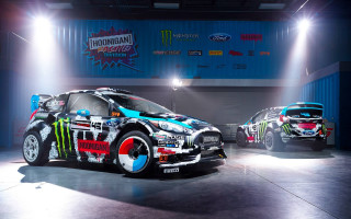 Monster car garage stage lighting - other car behind free wallpaper