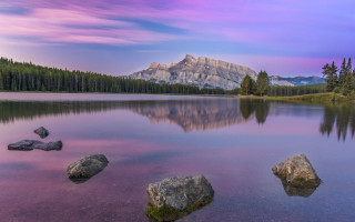 Mountain reflection lake urban sky - a purple sky above free wallpaper