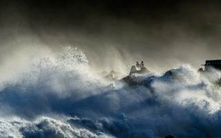 Stormy lighthouse wave people building - the top of it free wallpaper