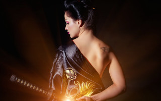 Woman black dress lit sword - a black dress holding free wallpaper