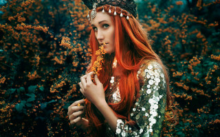 Red haired woman eating food - a piece of food free wallpaper