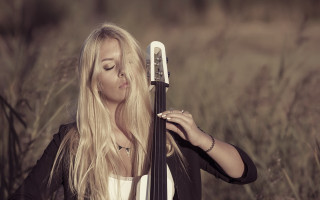 Woman holding cello tall grass - florianne becker free wallpaper