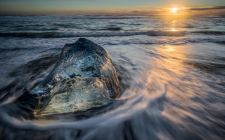 Ocean sunset rock wave beach - a rock in the ocean free wallpaper