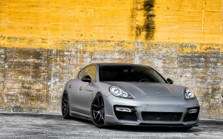 Silver sports car yellow wall - a yellow wall free wallpaper