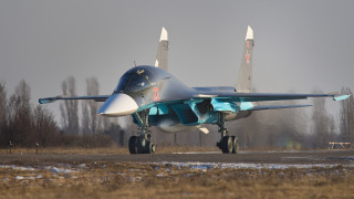 Fighterjet runway trees grass sky 2 - front view free wallpaper