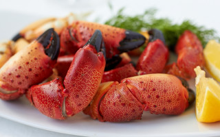 Lobsters lemon wedges plate food - a fork and knife free wallpaper