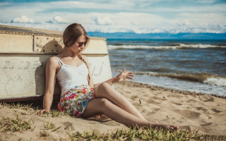 Woman beach suitcase kitsch stock - the sand free wallpaper