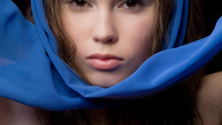 Woman blue scarf serious portrait - a blue scarf free wallpaper