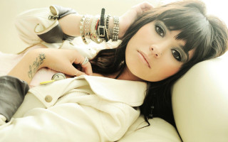 Beautiful tattooed woman couch blackhair - visual art free wallpaper