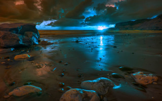 Beach rocks water cloudy sky - mystical free wallpaper