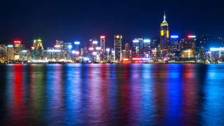 City skyline night lights water 3 - the water and a boat free wallpaper