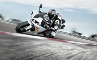 Motorcycle driving sunny day motion - a track free wallpaper